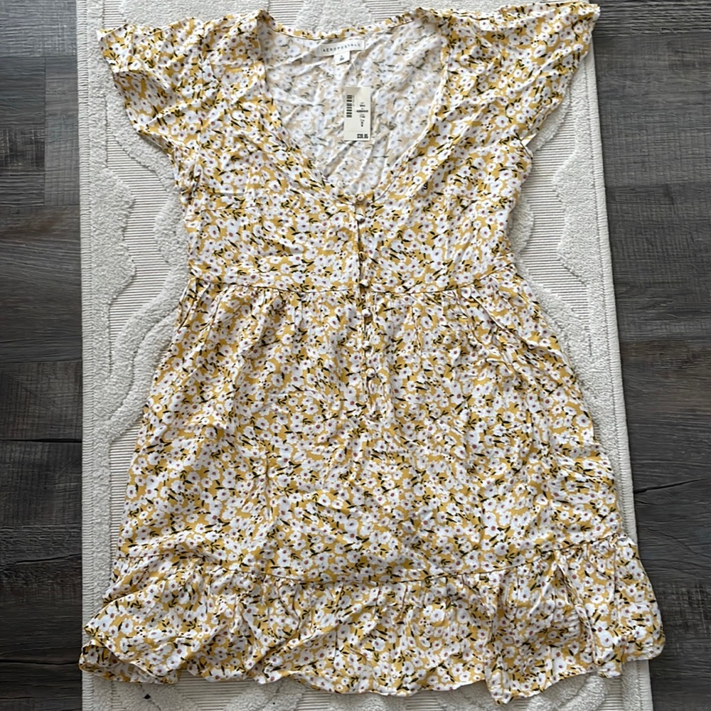 Aeropostale dress, size small, yellow with white flowers, never worn.